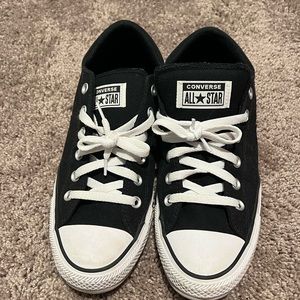woman’s black converse